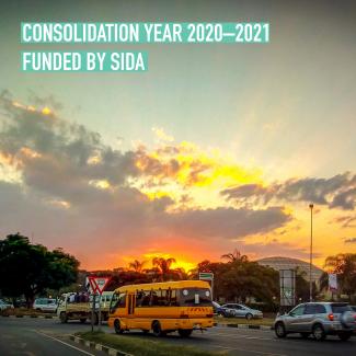 Cairo Rd in Lusaka. Text saying Consolidation Year Funded by Sida